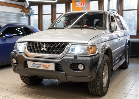 Установка линз в фары Mitsubishi Pajero Sport (2004)