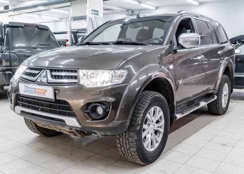 Замена ксеноновых линз Mitsubishi Pajero Sport II рестайлинг 2015 года